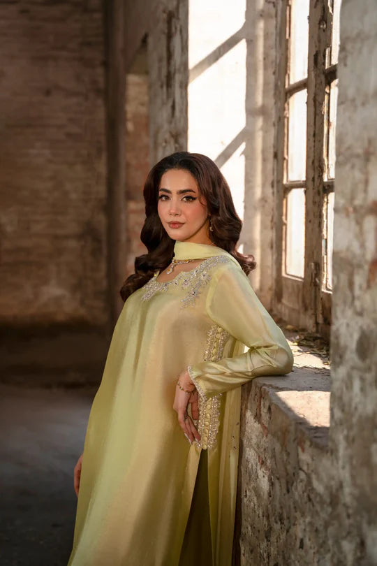Lemon yellow Tussel Silk Farshi suit worn by model - AYVO South Asian fashion UK